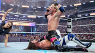 Flexing. (Image credits: wwe.com)
